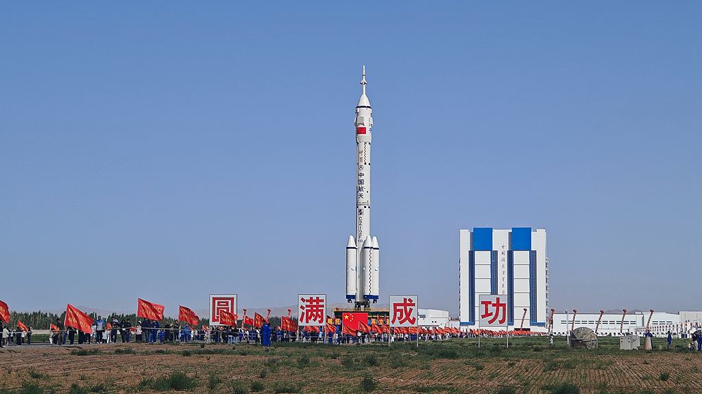 The combination of the Shenzhou-23 crewed spacecraft and the Long March-2F Y23 carrier rocket transferred to the launchpad at Jiuquan Satellite Launch Center in northwest China, May 16, 2026. /VCG