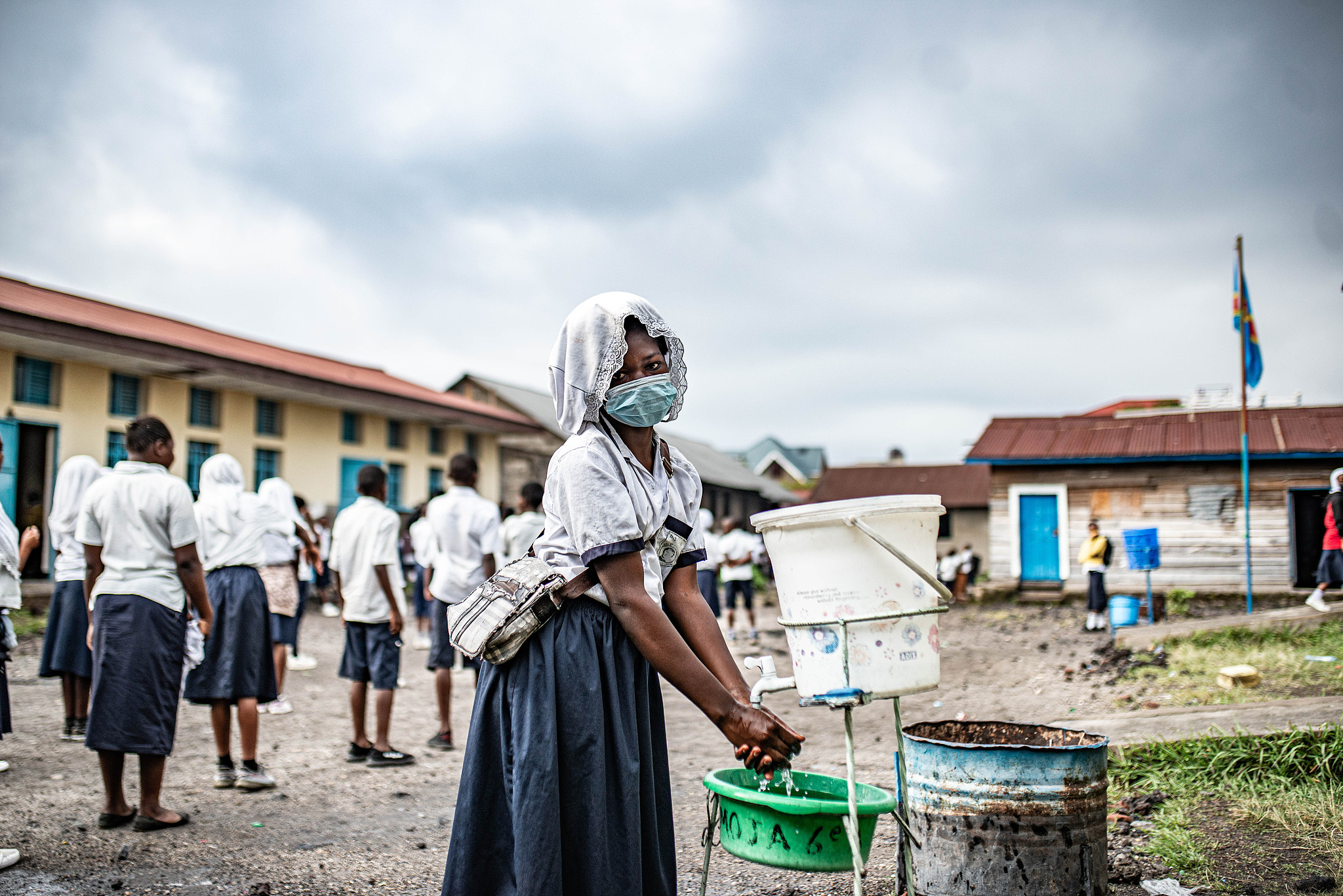 A pupil washes her hands at the Umoja primary school after health checks were introduced amid the regional Ebola outbreak, Goma, the Democratic Republic of Congo, May 20, 2026. /VCG