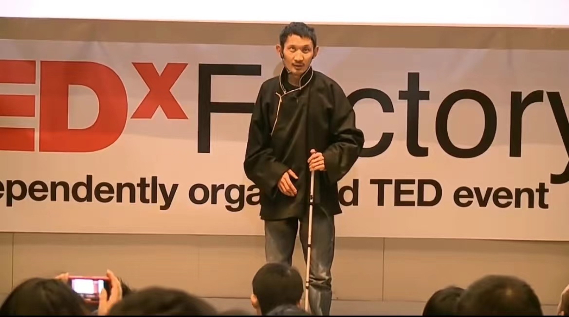 Nyima Wangdu delivering a speech at a TEDx event in Beijing, China, April 1, 2012. /Courtesy of Nyima Wangdu