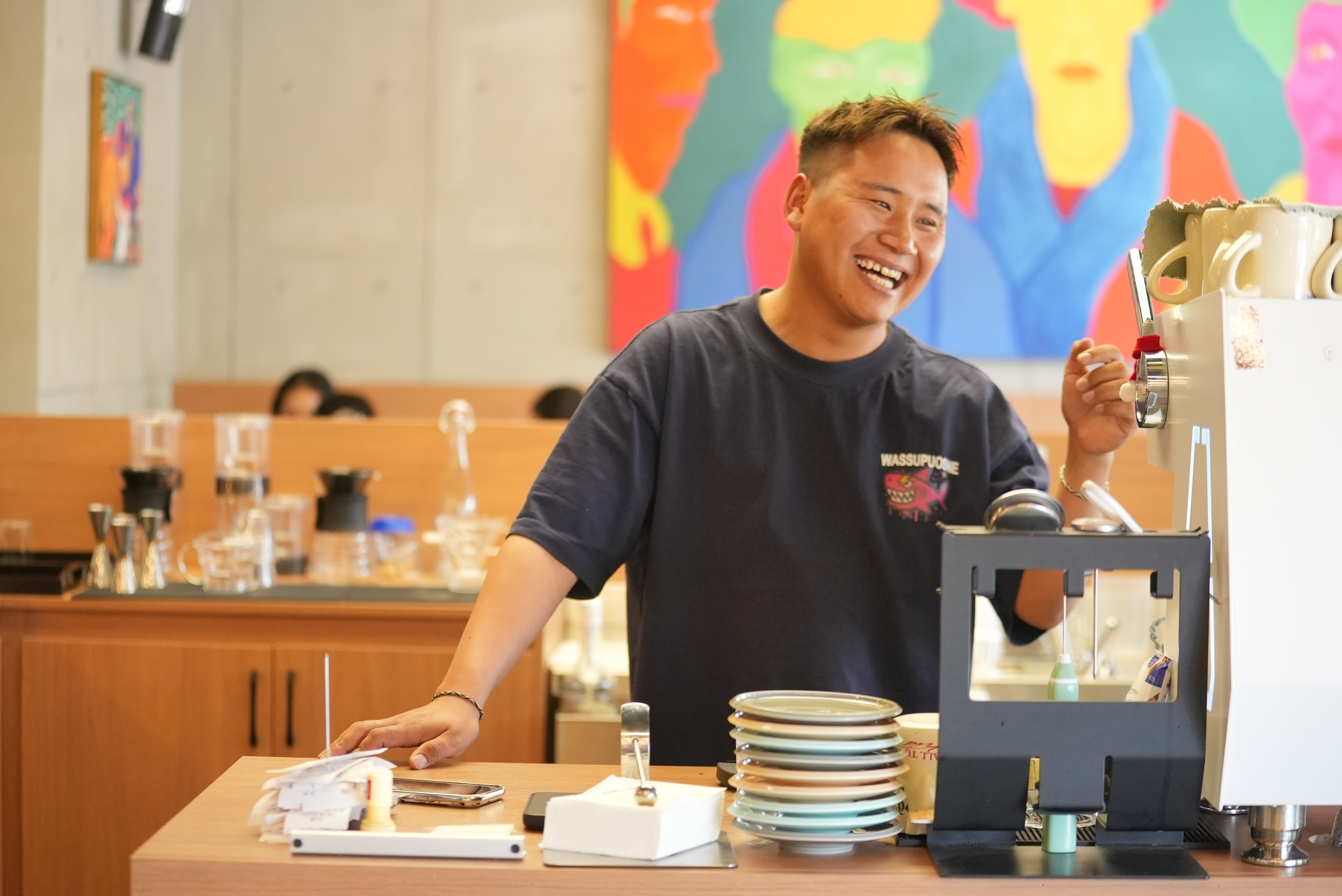A barista at the Hima Hima Art Cafe in Lhasa, Xizang Autonomous Region, China, May 21, 2026. Li Jian/CGTN