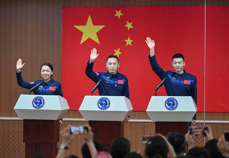 Chinese taikonauts Zhu Yangzhu (C), Zhang Zhiyuan (R) and Li Jiaying (or Lai Ka-ying in Cantonese), members of the Shenzhou-23 crewed spaceflight mission, meet the press at the Jiuquan Satellite Launch Center in northwest China, May 23, 2026. /Xinhua