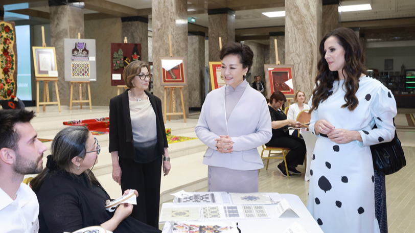 Peng Liyuan, wife of Chinese President Xi Jinping, and Tamara Vucic, wife of Serbian President Aleksandar Vucic, visited the National Museum of Serbia in Belgrade, Serbia, May 8, 2024. /Xinhua