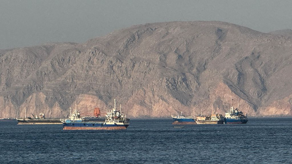 Vessels are seen anchored in the Strait of Hormuz, off the port city of Khasab, Oman's northern Musandam Peninsula on May 17, 2026. /VCG