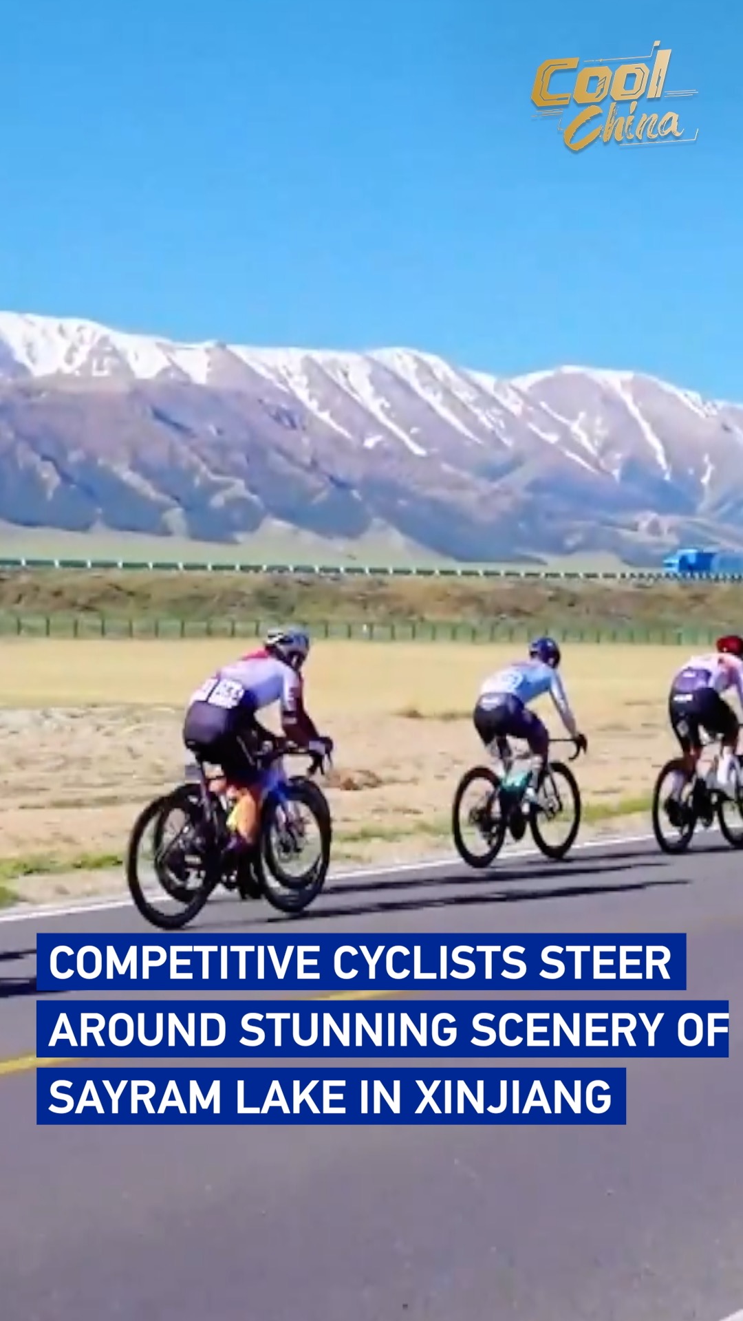 Competitive cyclists steer around stunning scenery of Sayram Lake