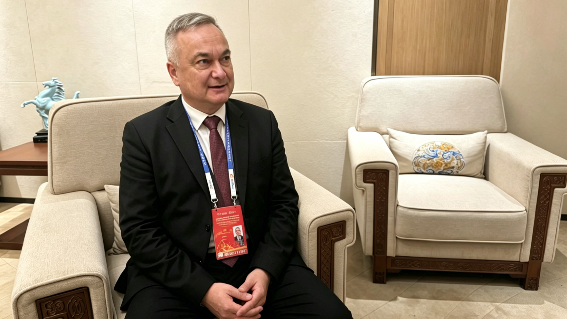 Szanto Zsolt, chief of staff of the mayor's cabinet of Bekescsaba, Hungary, reacts during an interview with CGTN on the sidelines of the 7th China-CEEC Local Leaders' Meeting in Jinan, Shandong Province, China, May 26, 2026. /CGTN