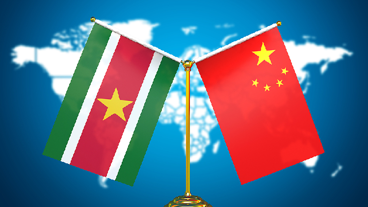 Xi, Suriname's Simons exchange congratulations on 50 years of ties