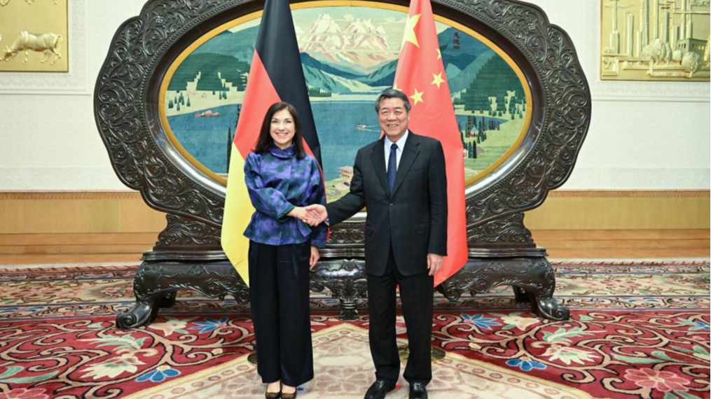 Chinese Vice Premier He Lifeng (R), also a member of the Political Bureau of the Communist Party of China Central Committee, shakes hands with German Economy and Energy Minister Katherina Reiche in Beijing, China, May 27, 2026. /Xinhua