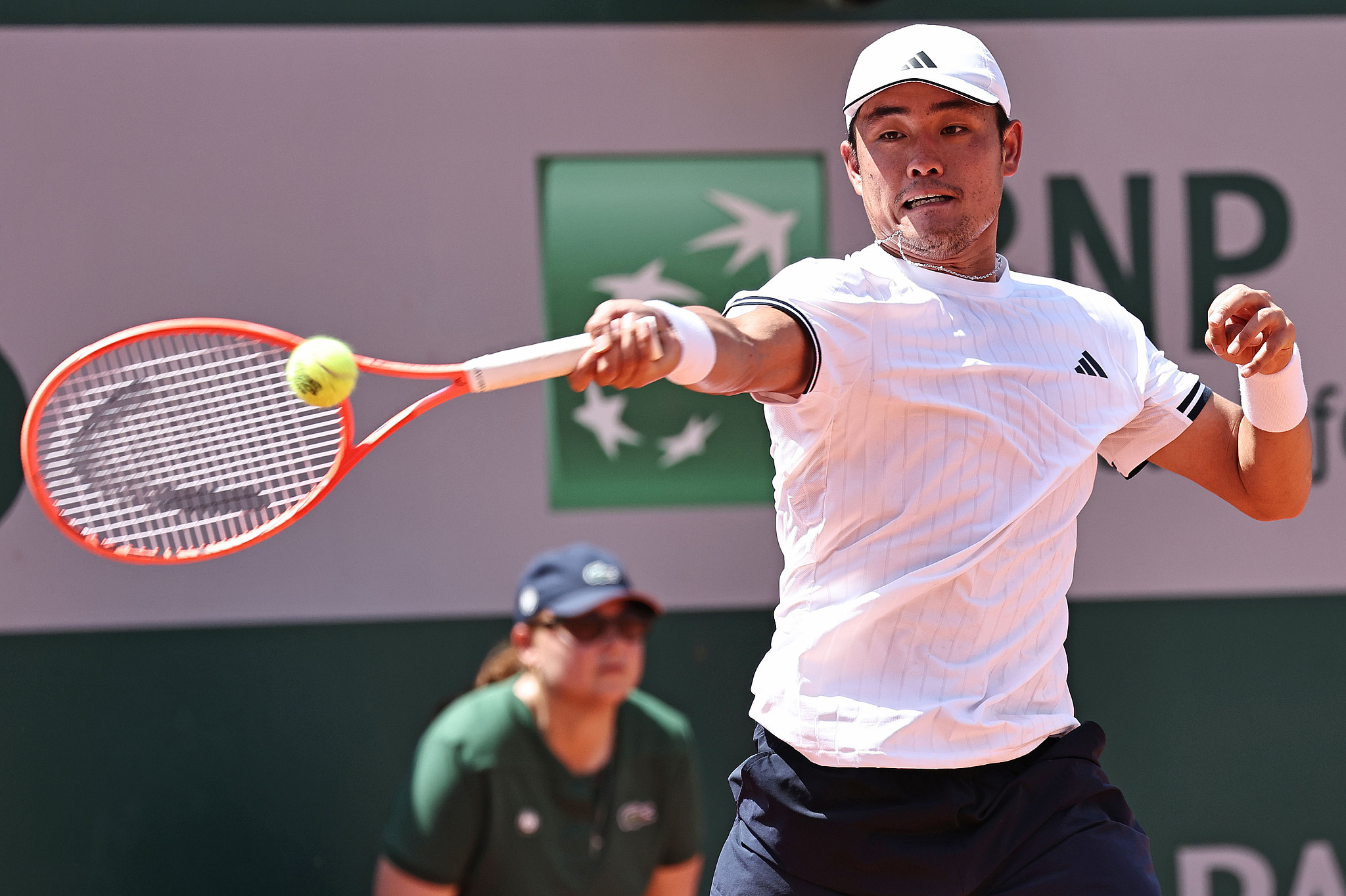China's Wu Yibing hits a return during the 5rd day of the French Open at Roland Garros in Paris, France, May 28, 2026. /VCG