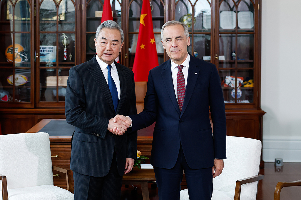 Chinese Foreign Minister Wang Yi meets with Canadian Prime Minister Mark Carney during a meeting in Ottawa, Ontario, Canada, May 29, 2026. /CFP