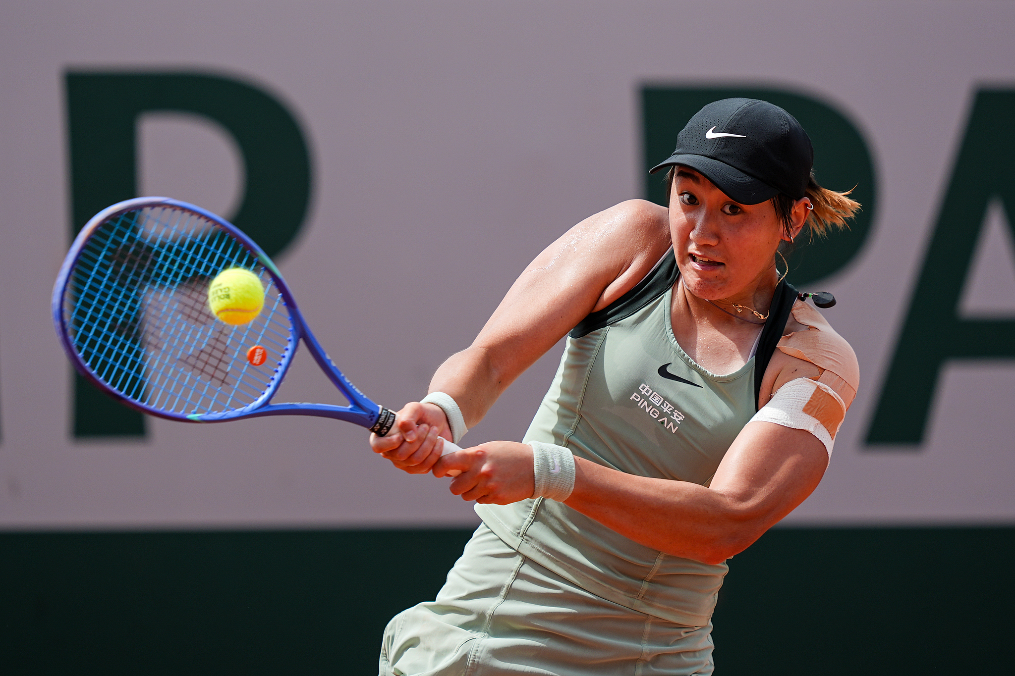Wang Xiyu of China hits a shot in the women's singles third-round match against Yuliia Starodubtseva of Ukraine in the French Open at Roland Garros in Paris, France, May 29, 2026. /VCG