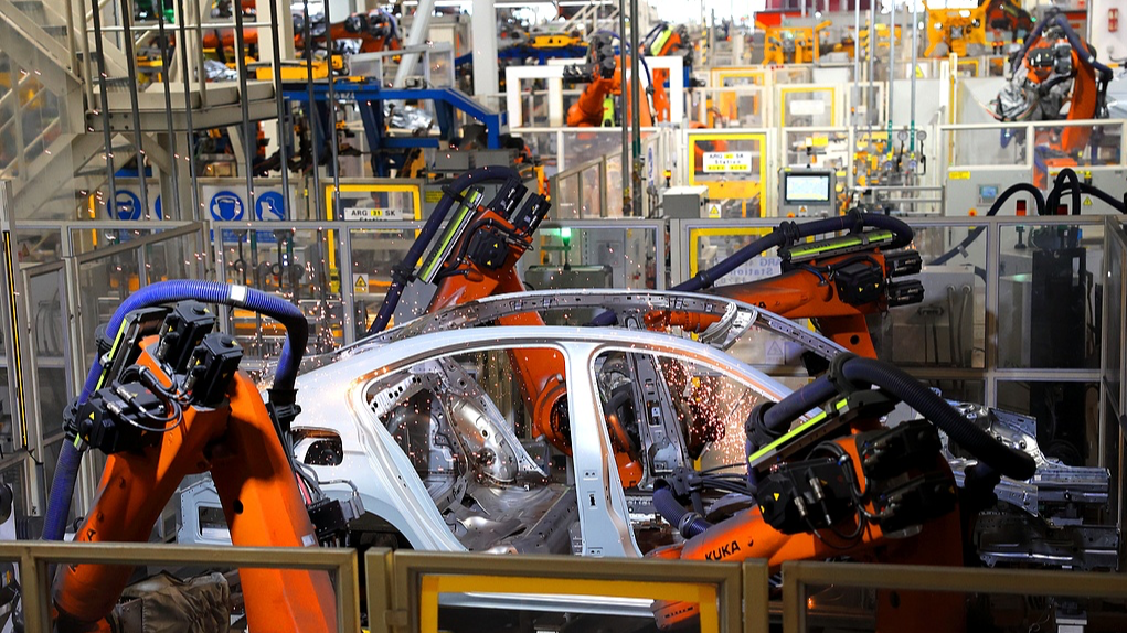 Robots perform welding operations at a workshop in Qingdao, Shandong Province, China, February 28, 2026. /VCG