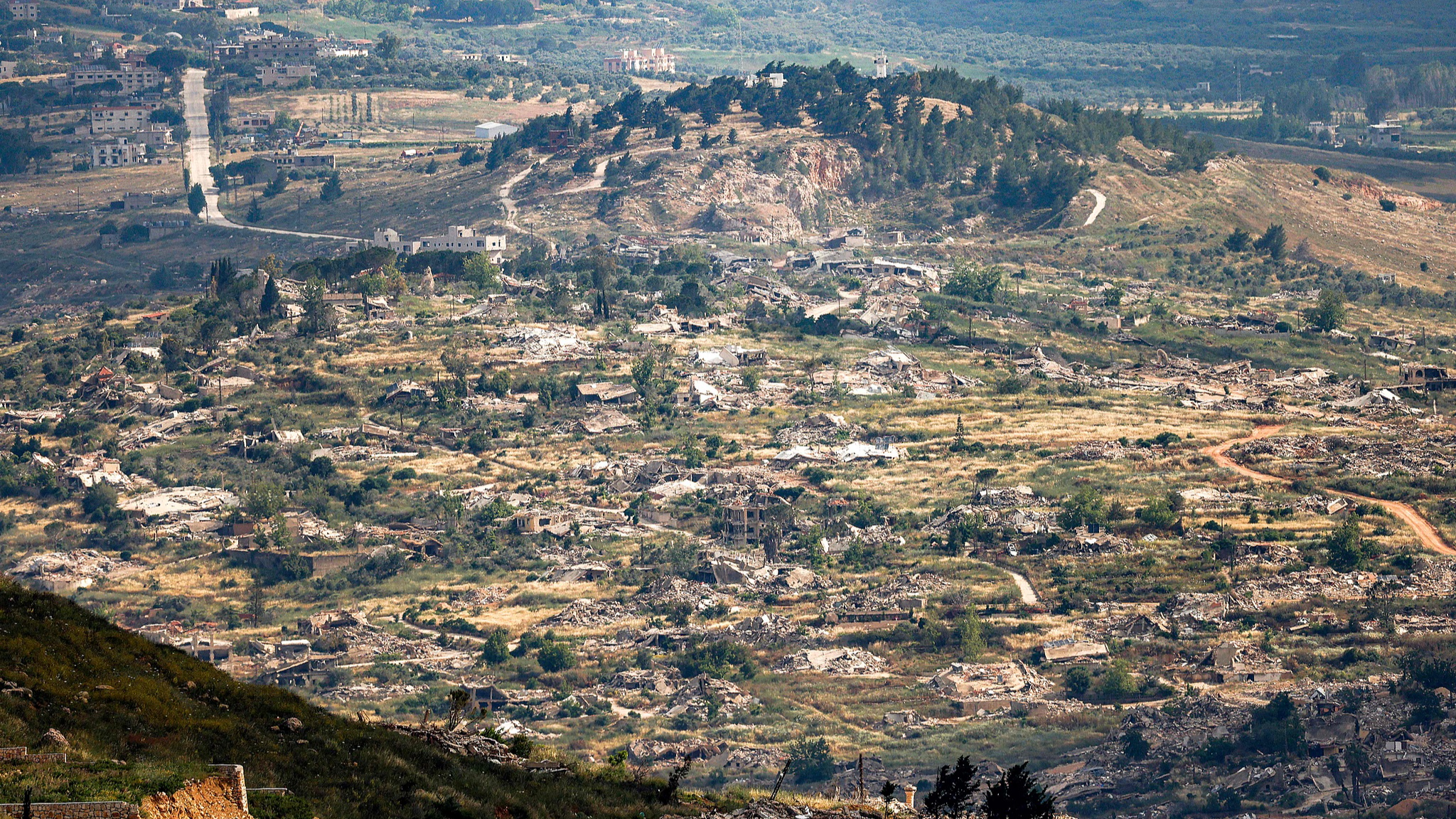 Destroyed buildings are pictured in the village of Kfarkila in southern Lebanon as seen from across the border in the Upper Galilee region of northern Israel, May 29, 2026. /VCG