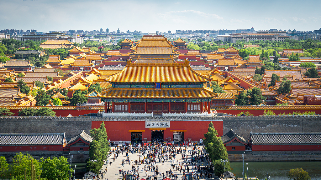 Crowds of visitors throng the Palace Museum along Beijing's central axis as viewed from Jingshan Hill on April 28, 2026. /VCG