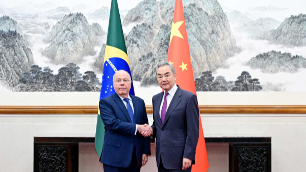 Chinese Foreign Minister Wang Yi (R) shakes hands with Brazilian Foreign Minister Mauro Vieira in Beijing, China, June 1, 2026. /Chinese Foreign Ministry