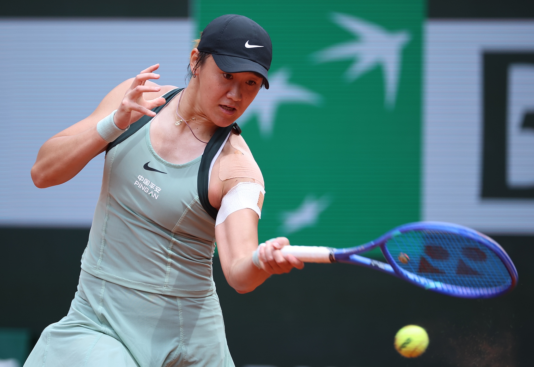 Wang Xiyu of China hits a shot in the women's singles round of 16 match against Sorana Cirstea of Romania at the French Open at Roland Garros in Paris, France, May 31, 2026. /VCG
