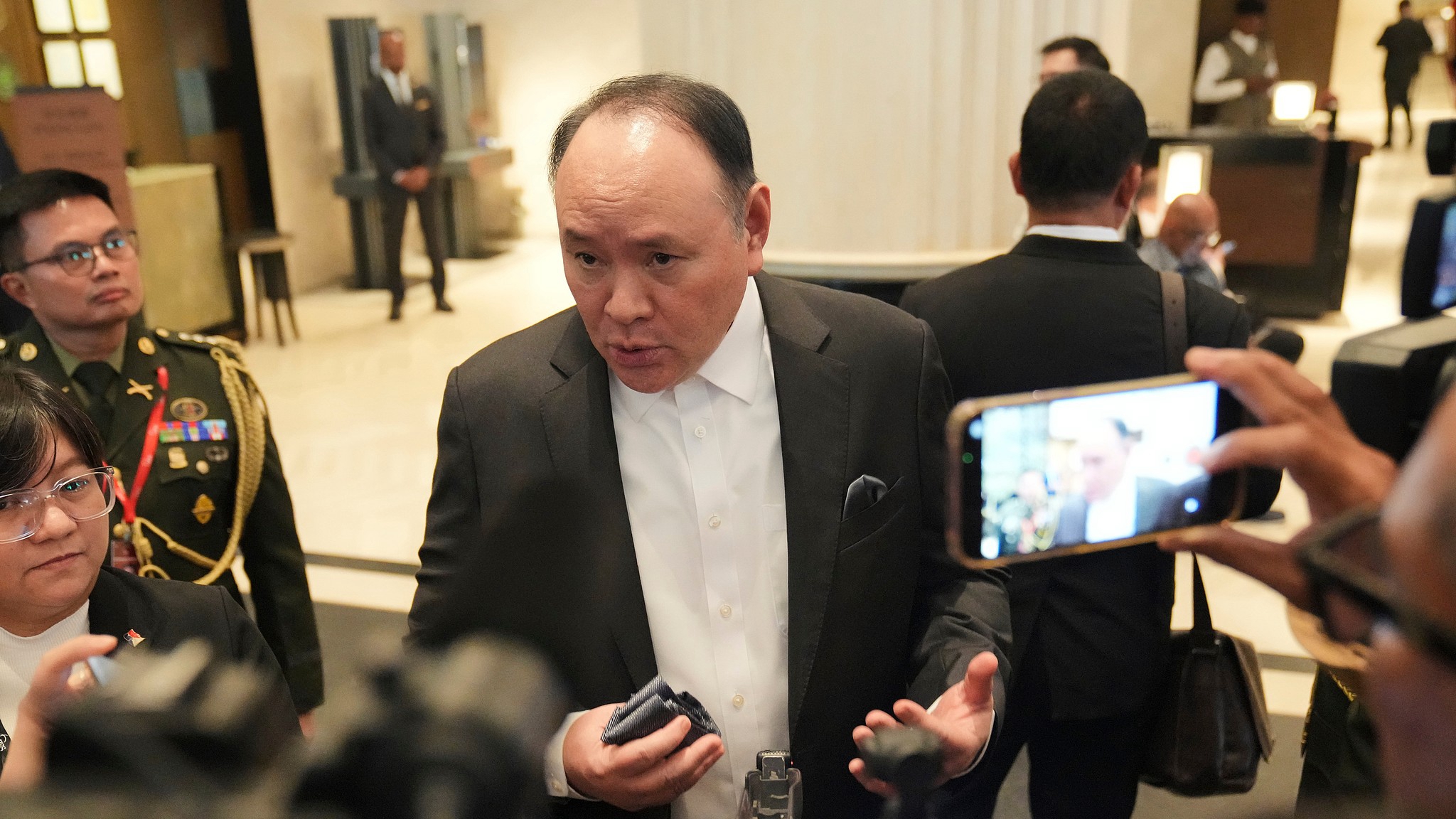 Philippine's Defense Secretary Gilberto Teodoro talks to the media as he attends the Shangri-La Dialogue in Singapore, May 29, 2026. /AP