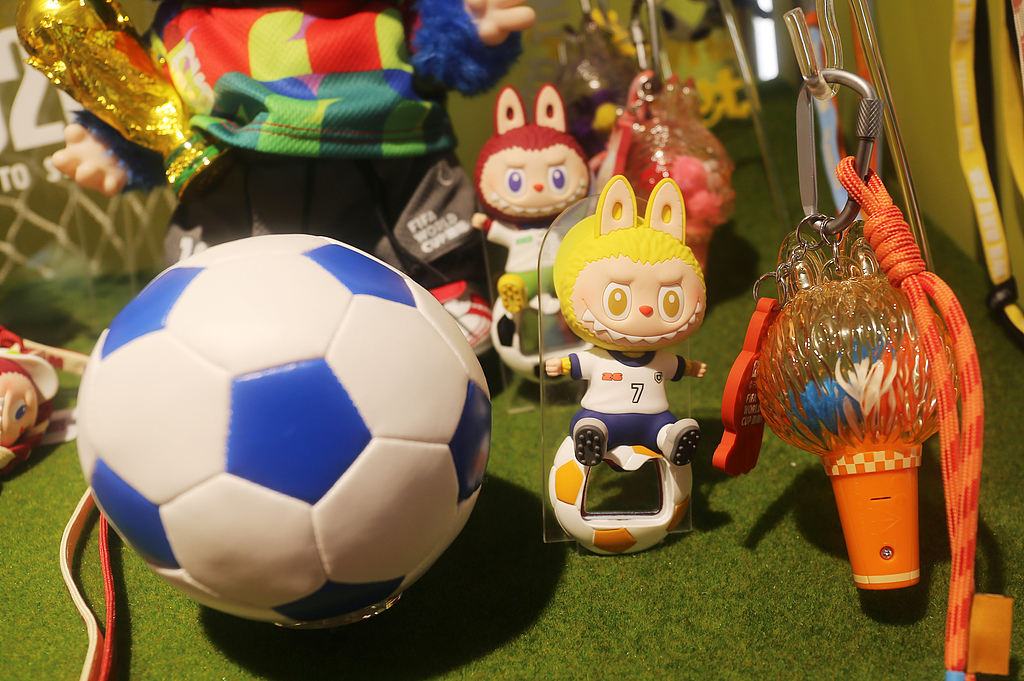 Labubu and the Monsters FIFA collaboration merchandise is seen on display at a Pop Mart store in Shanghai on June 1, 2026. /VCG