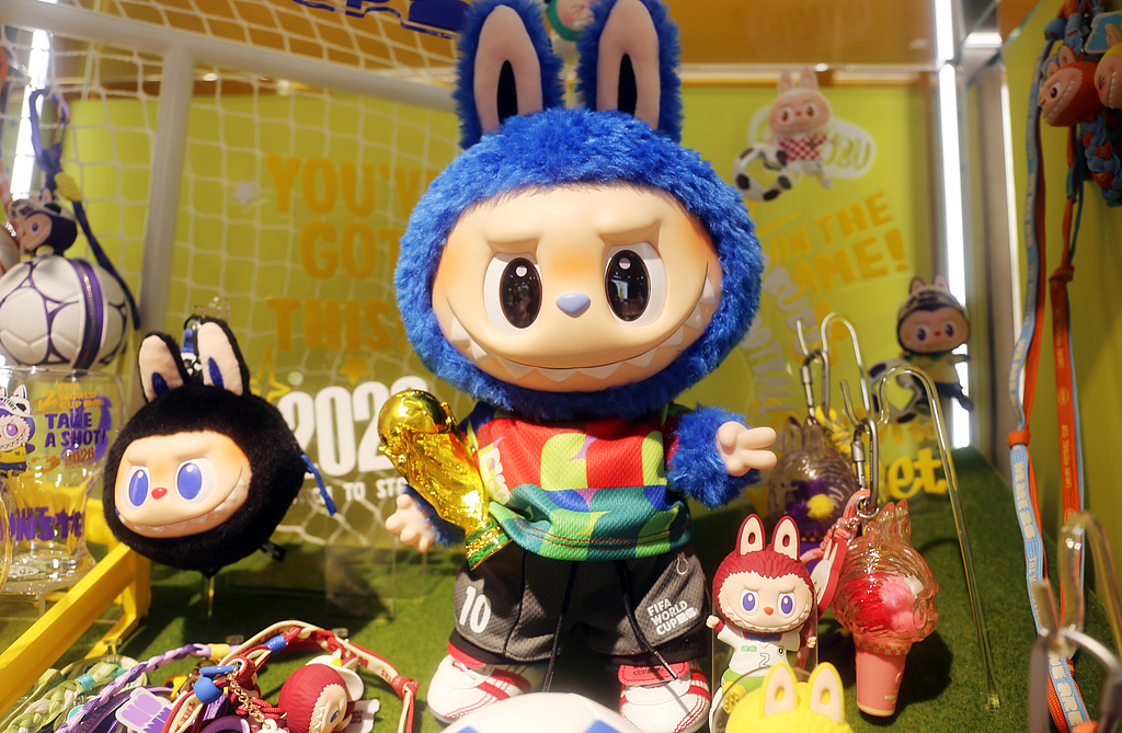 A Labubu figure dressed as a football No. 10 player in a special World Cup jersey is seen on display at a Pop Mart store in Shanghai on June 1, 2026. /VCG