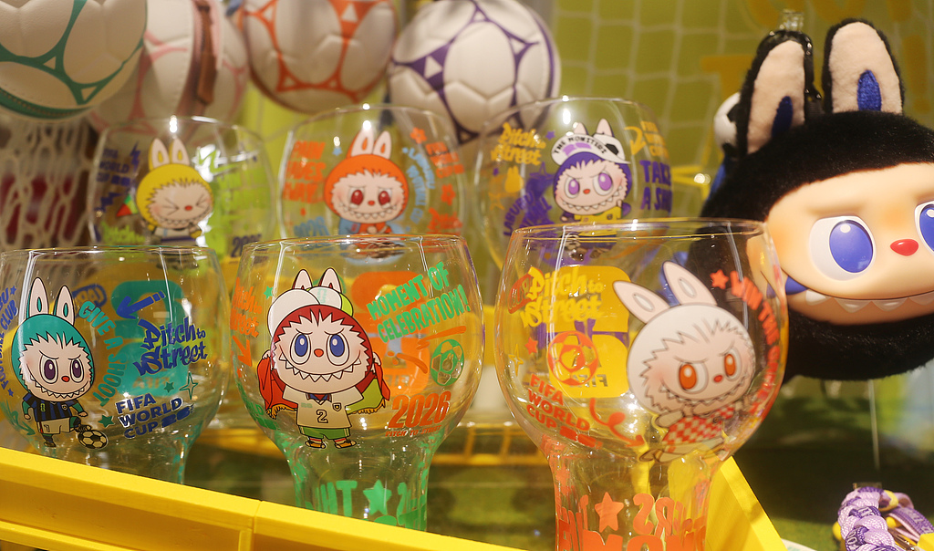 Labubu and the Monsters FIFA collaboration merchandise is seen on display at a Pop Mart store in Shanghai on June 1, 2026. /VCG