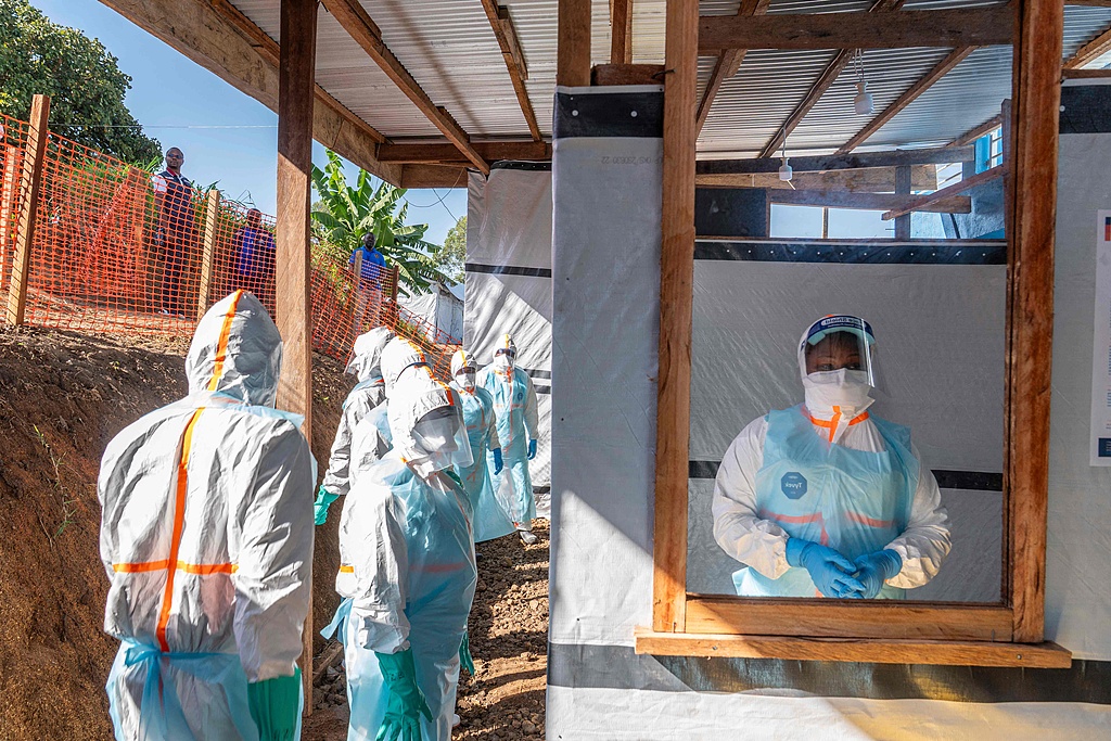 Health workers stand in a new Ebola treatment center during a visit of Tedros Adhanom Ghebreyesus, director-general of the World Health Organization, in Bunia, Democratic Republic of the Congo, May 31, 2026. /VCG