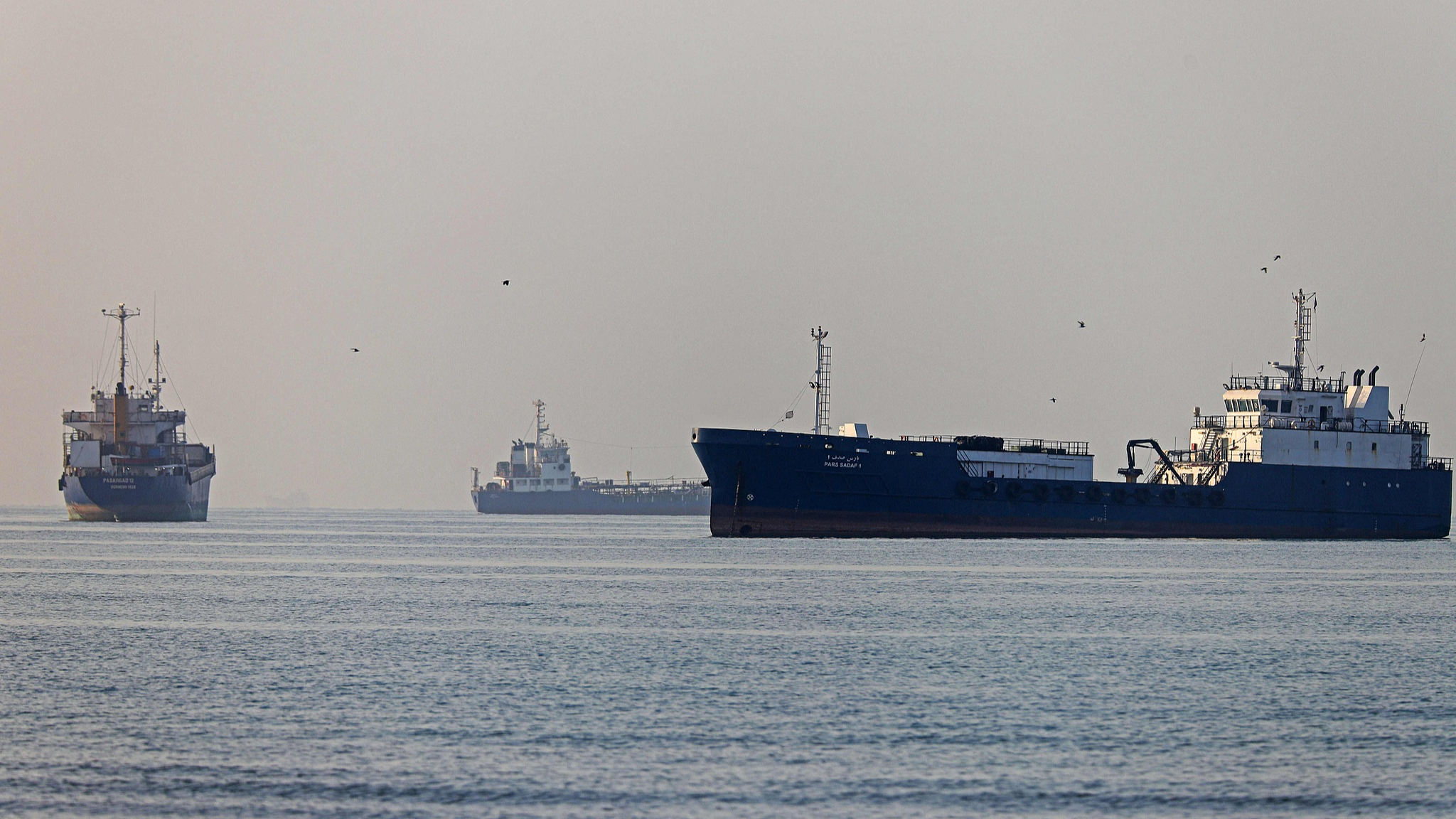Iran says it fired missile at ship linked to US, Israel