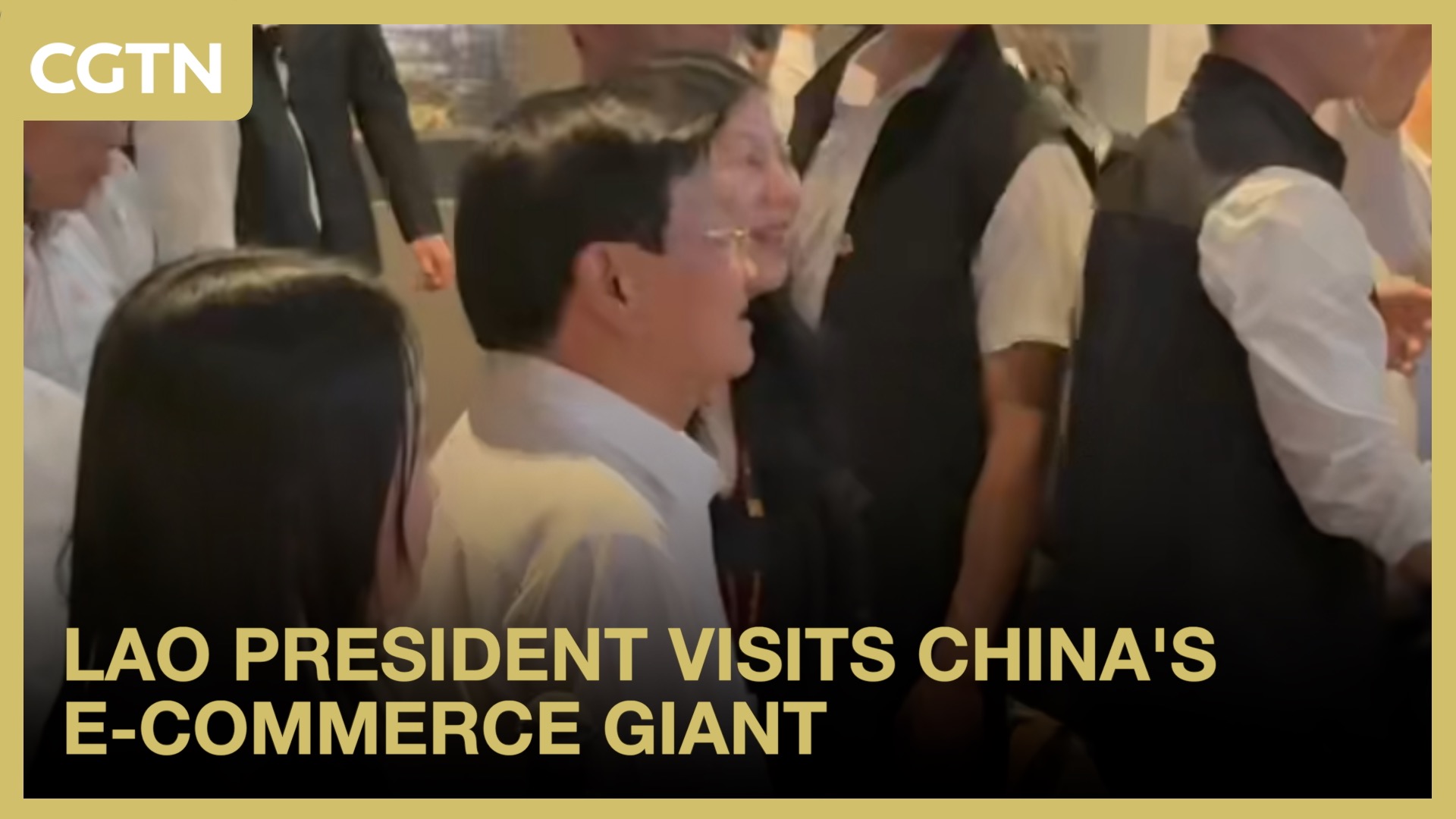 Lao President visits China's e-commerce giant