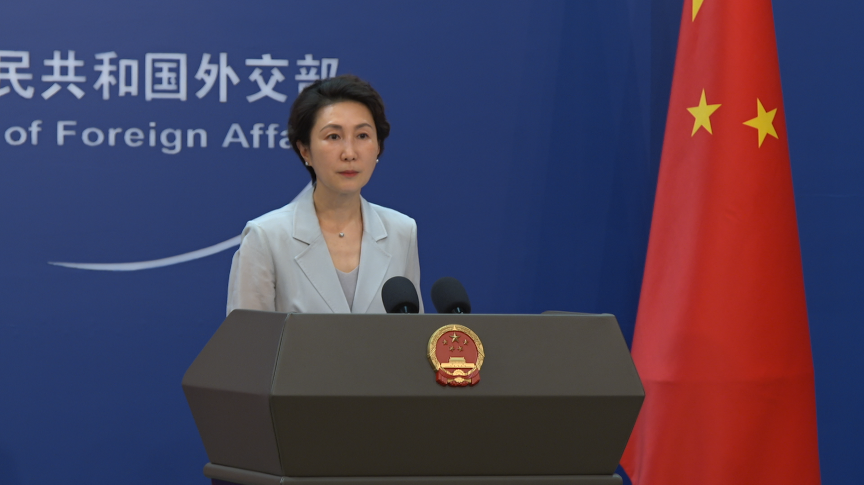 China accuses Japan of whitewashing military buildup