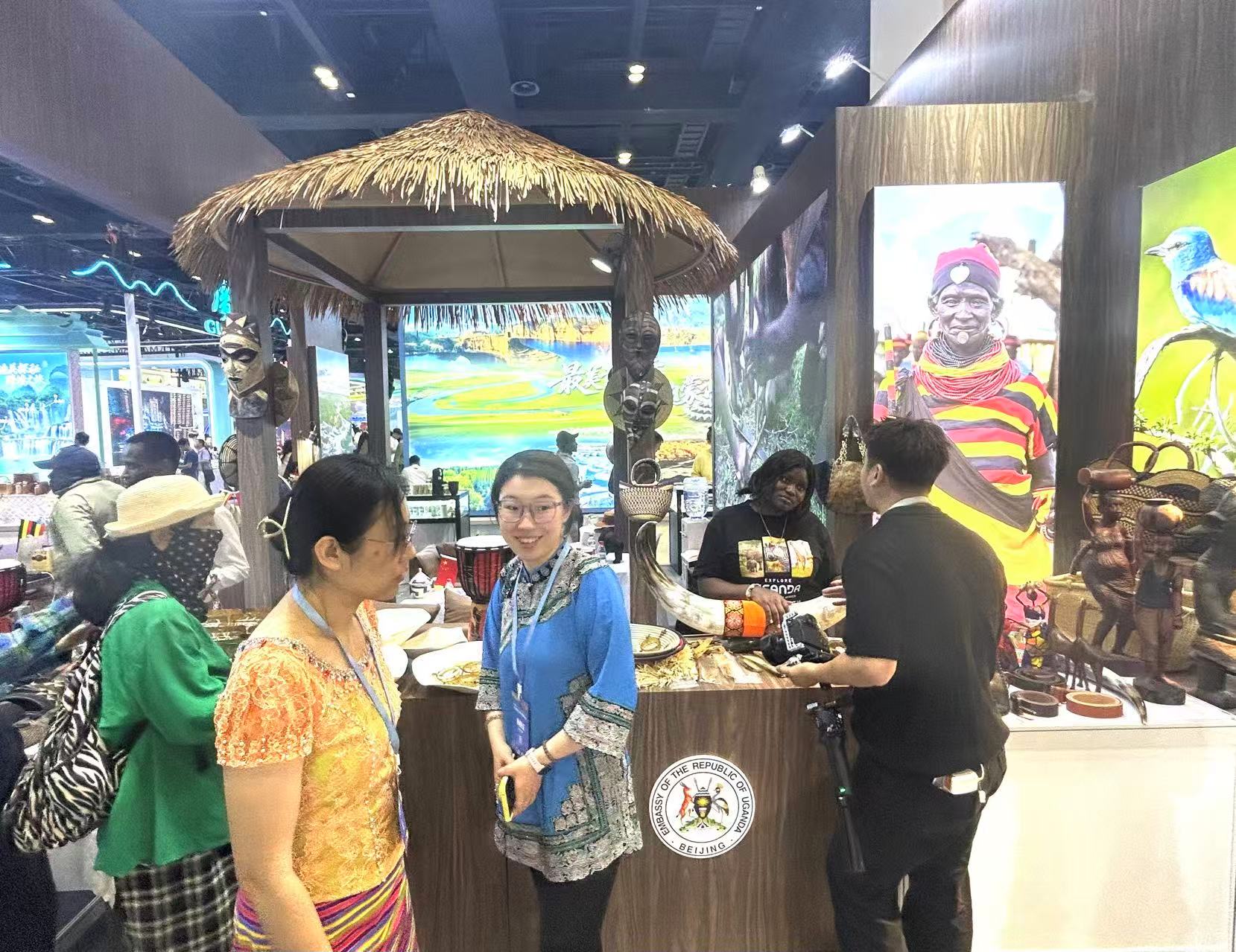 Visitors chat at Uganda's booth at the 2026 Beijing Inbound Tourism Development Conference and Beijing International Cultural Tourism Consumption Expo on Friday, June 5, 2026./CGTN