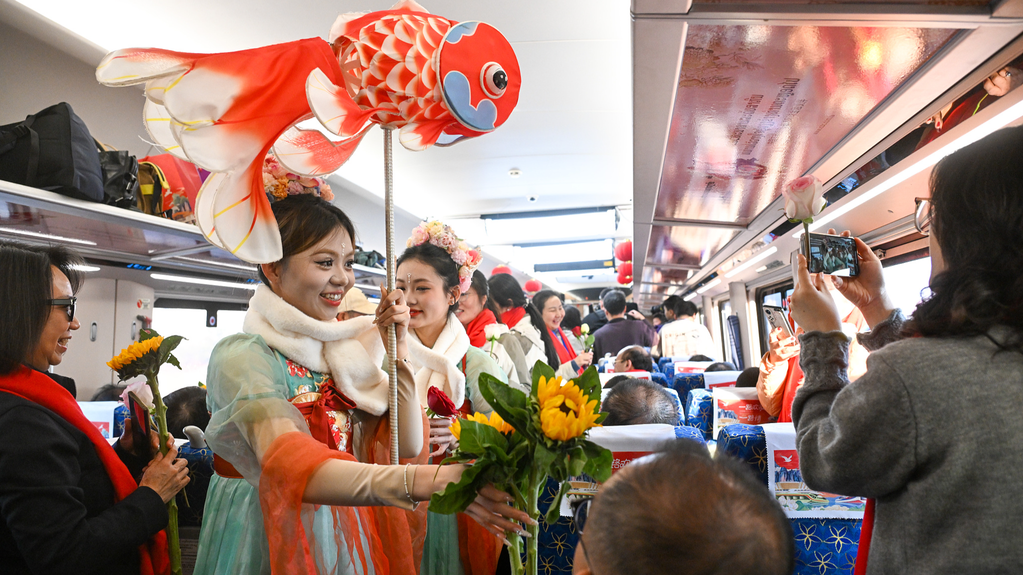 An international passenger train on the China-Laos Railway hosts a Spring Festival-themed cultural event on February 4, 2026. /VCG