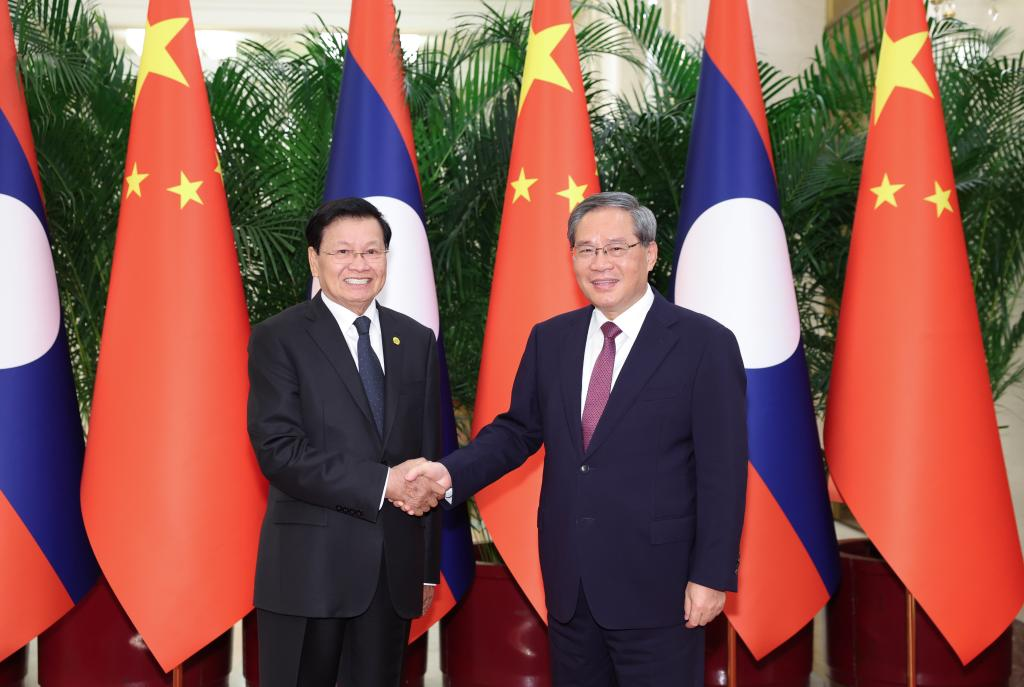 Chinese Premier Li Qiang (R) meets with General Secretary of the Lao People's Revolutionary Party Central Committee and Lao President Thongloun Sisoulith, who is on a state visit to China, at the Great Hall of the People in Beijing, capital of China, June 5, 2026. /Xinhua