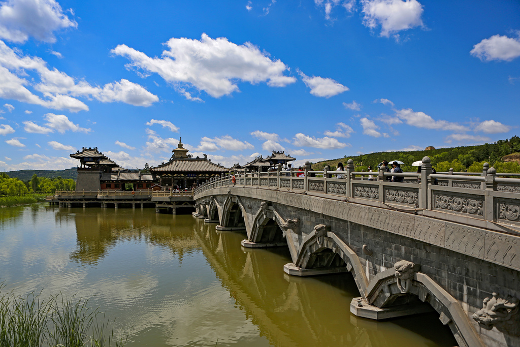 Crowds of tourists flock to the Yungang Grottoes scenic area in Datong, Shanxi, June 6, 2026. /VCG