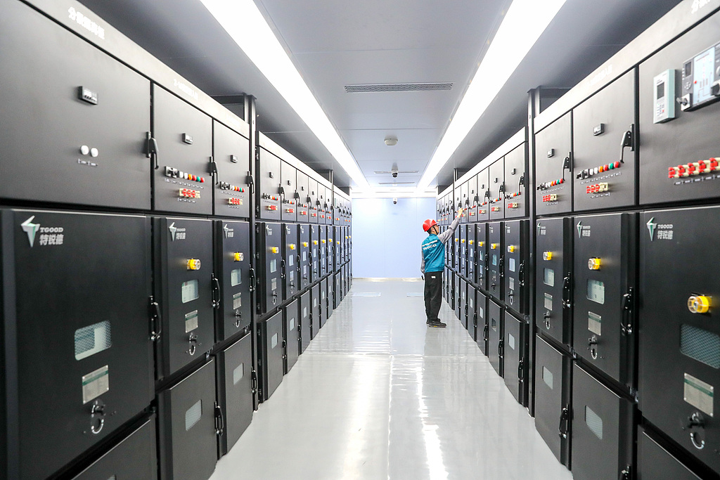 Technicians conduct a safety inspection inside the computing center base in Qingdao, east China's Shandong Province, June 6, 2026. /VCG