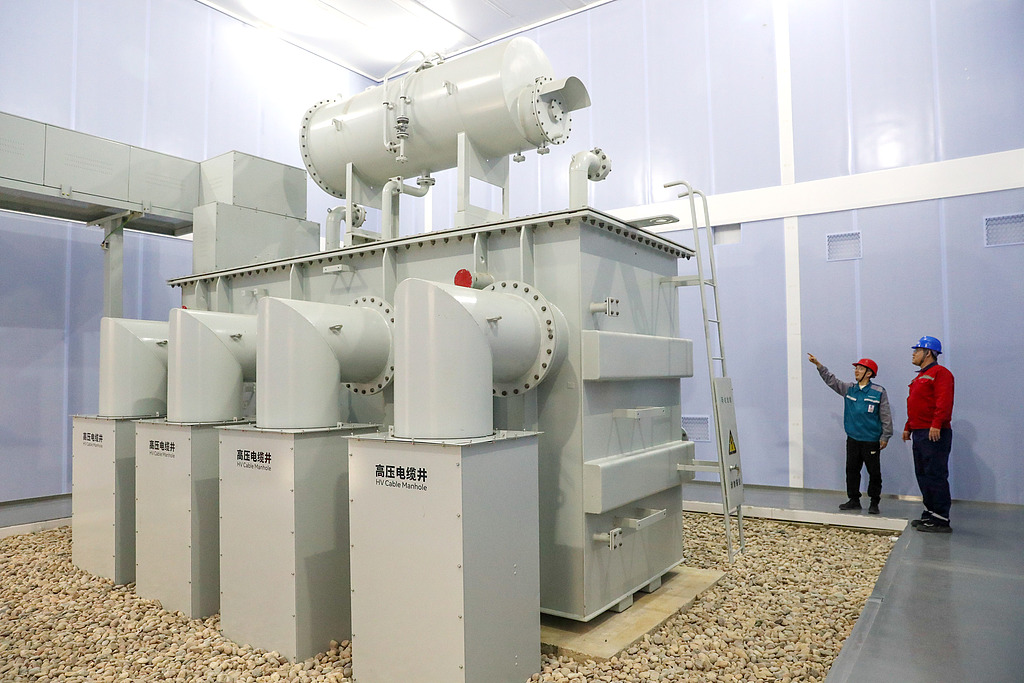 Technicians conduct a safety inspection inside the computing center base in Qingdao, east China's Shandong Province, June 6, 2026. /VCG
