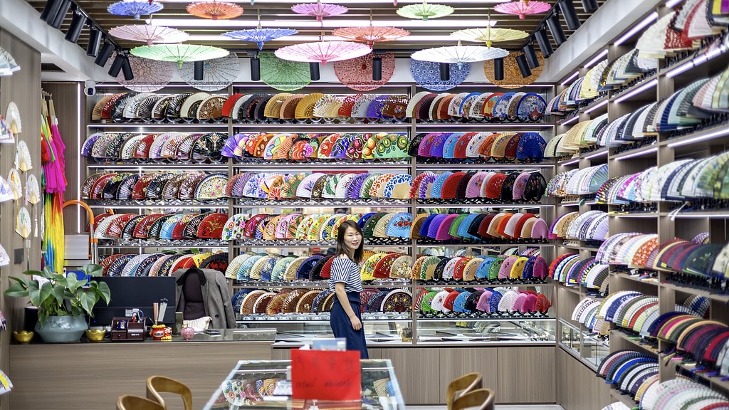 A woman seen browsing at the Yiwu International Trade City, Zhejiang Province, China, May 26, 2026. /VCG