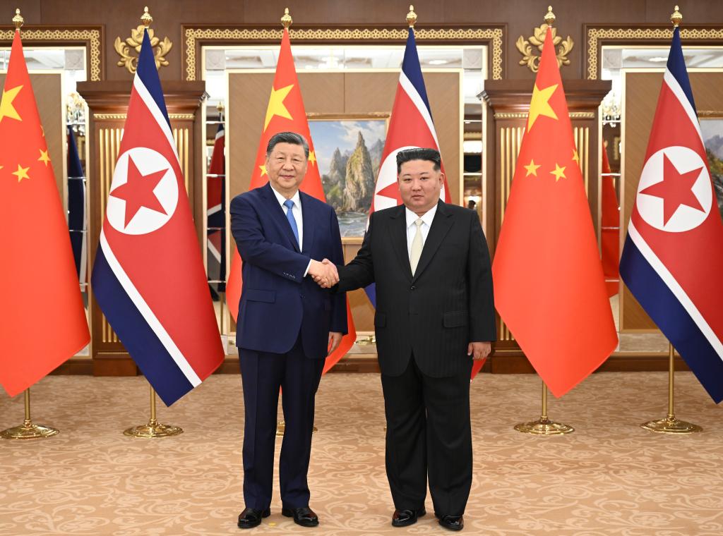 Xi Jinping, general secretary of the Communist Party of China Central Committee and Chinese president, shakes hands with Kim Jong Un, general secretary of the Workers' Party of Korea and president of the State Affairs of the Democratic People's Republic of Korea (DPRK), at the Kumsusan State Guesthouse in Pyongyang, the DPRK, June 8, 2026. /Xinhua