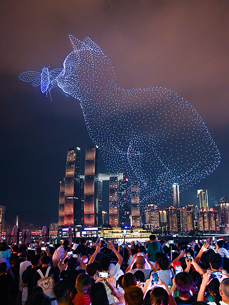 A drone light show illuminates the night sky over Chongqing, China, August 30, 2025. /VCG