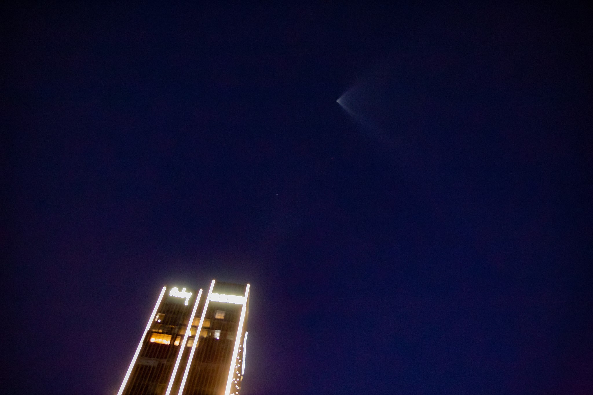 A bright trail left by a Long March-6A rocket streaks across the night sky after launch, Zhuhai City, south China's Guangdong Province, June 4, 2026. /VCG