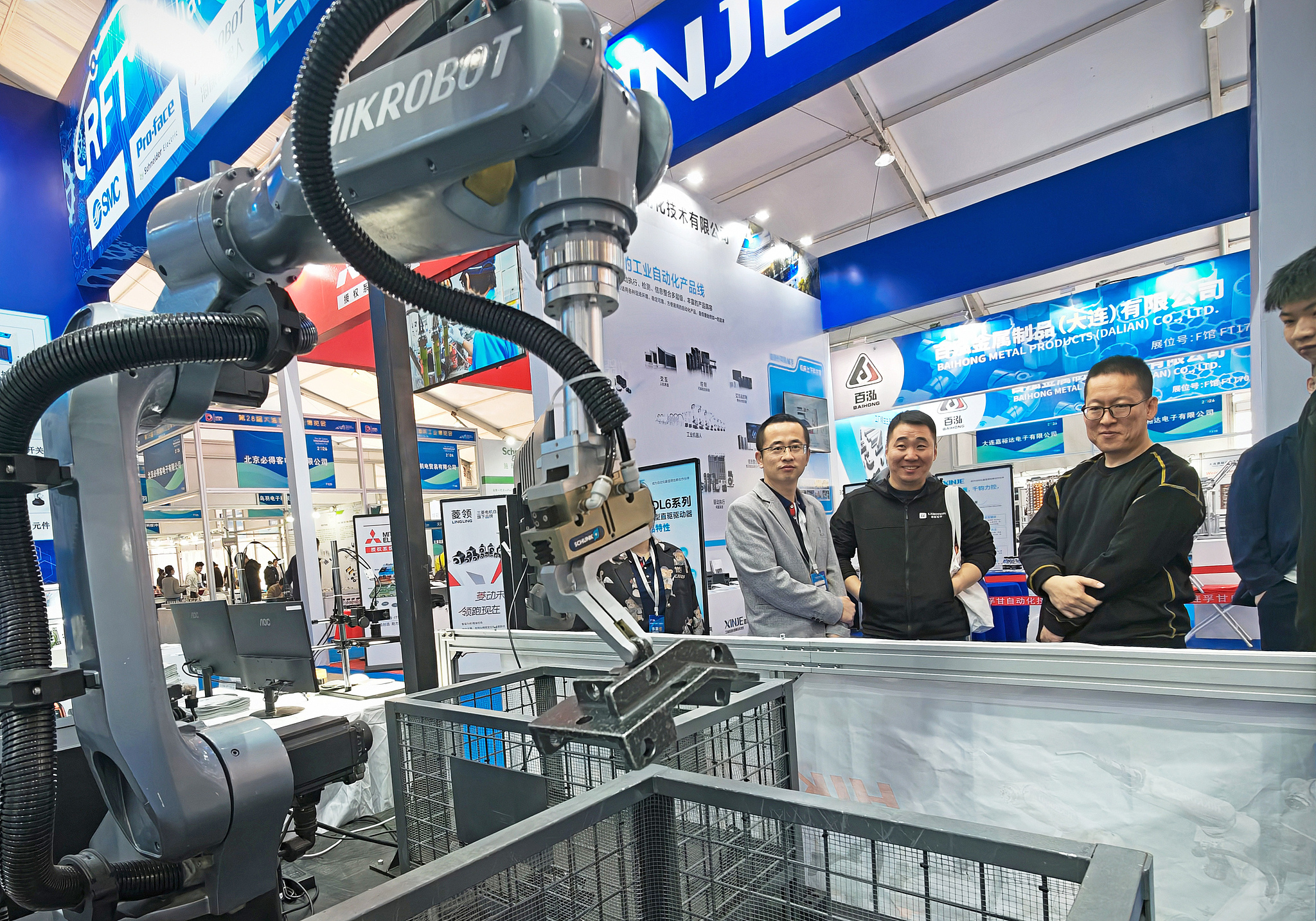  Visitors tour the exhibition at the 2026 Dalian International Industrial Expo in Dalian, Liaoning Province, May 13, 2026. /VCG