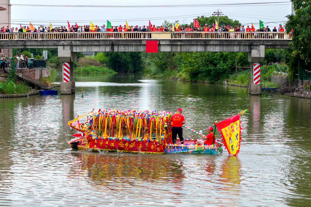 A launch ceremony for floral dragon boats is held in Hongqiao Town, Changxing County, Huzhou City, Zhejiang Province on June 9, 2026. /VCG