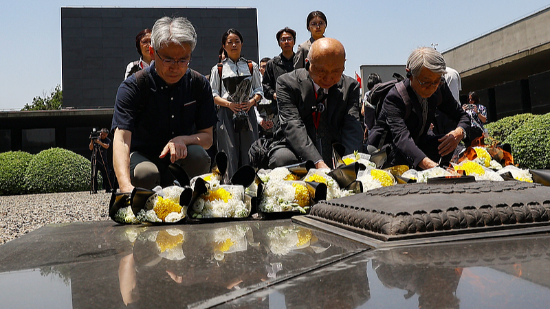 Chinese and foreign experts and scholars attending the international seminar commemorating the 80th anniversary of the opening of the Tokyo Trial visited the Nanjing Massacre Memorial Hall for the victims of the Japanese invasion in Nanjing, Jiangsu, May 29, 2026. /CFP 