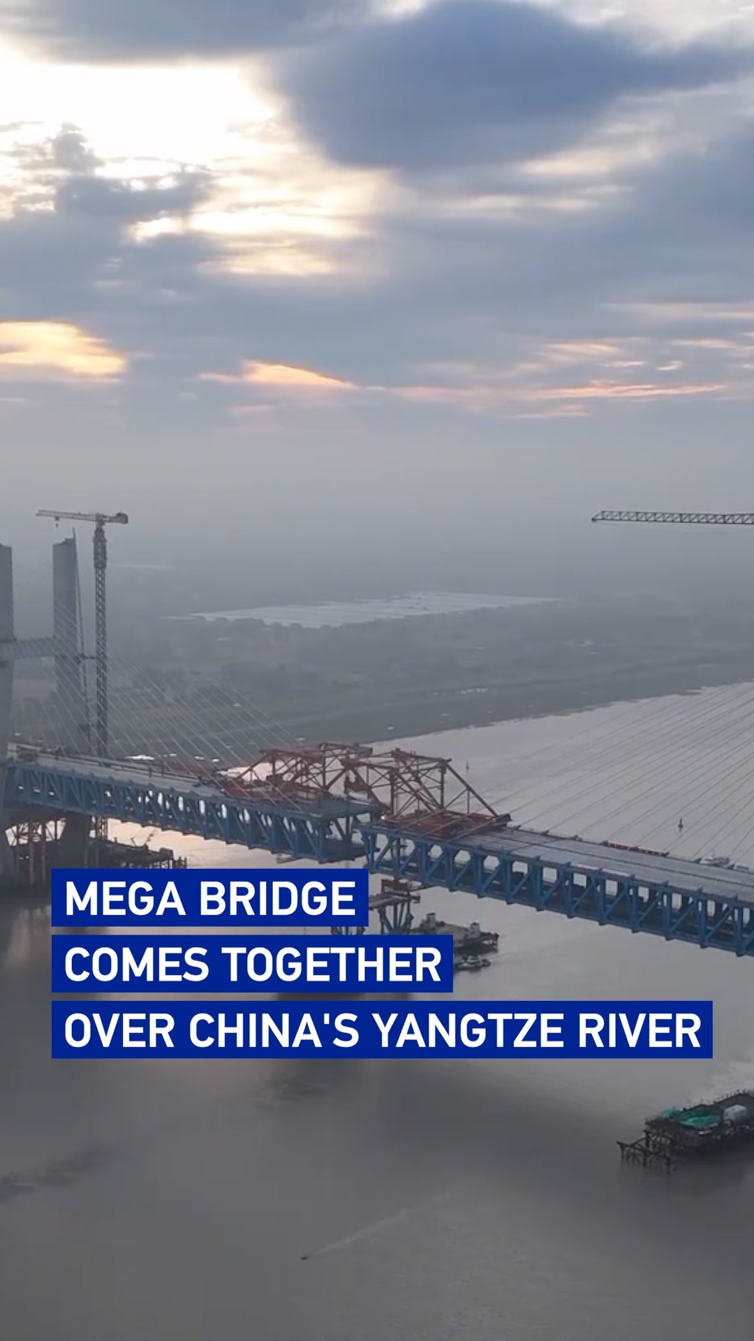 Mega bridge comes together over China's Yangtze River 