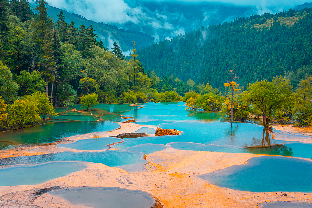 Huanglong Scenic and Historic Interest Area is seen in Sichuan. /VCG