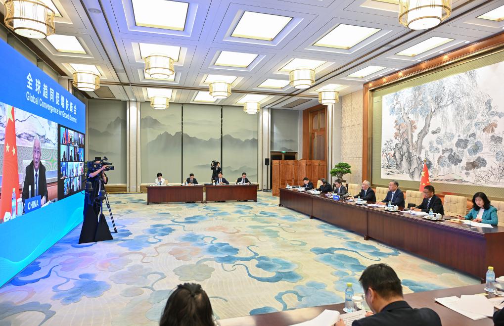 Chinese Vice Premier Zhang Guoqing, also a member of the Political Bureau of the Communist Party of China Central Committee, addresses the World Convergence Summit for Growth via video link at the invitation of the French government, June 11, 2026. /Xinhua