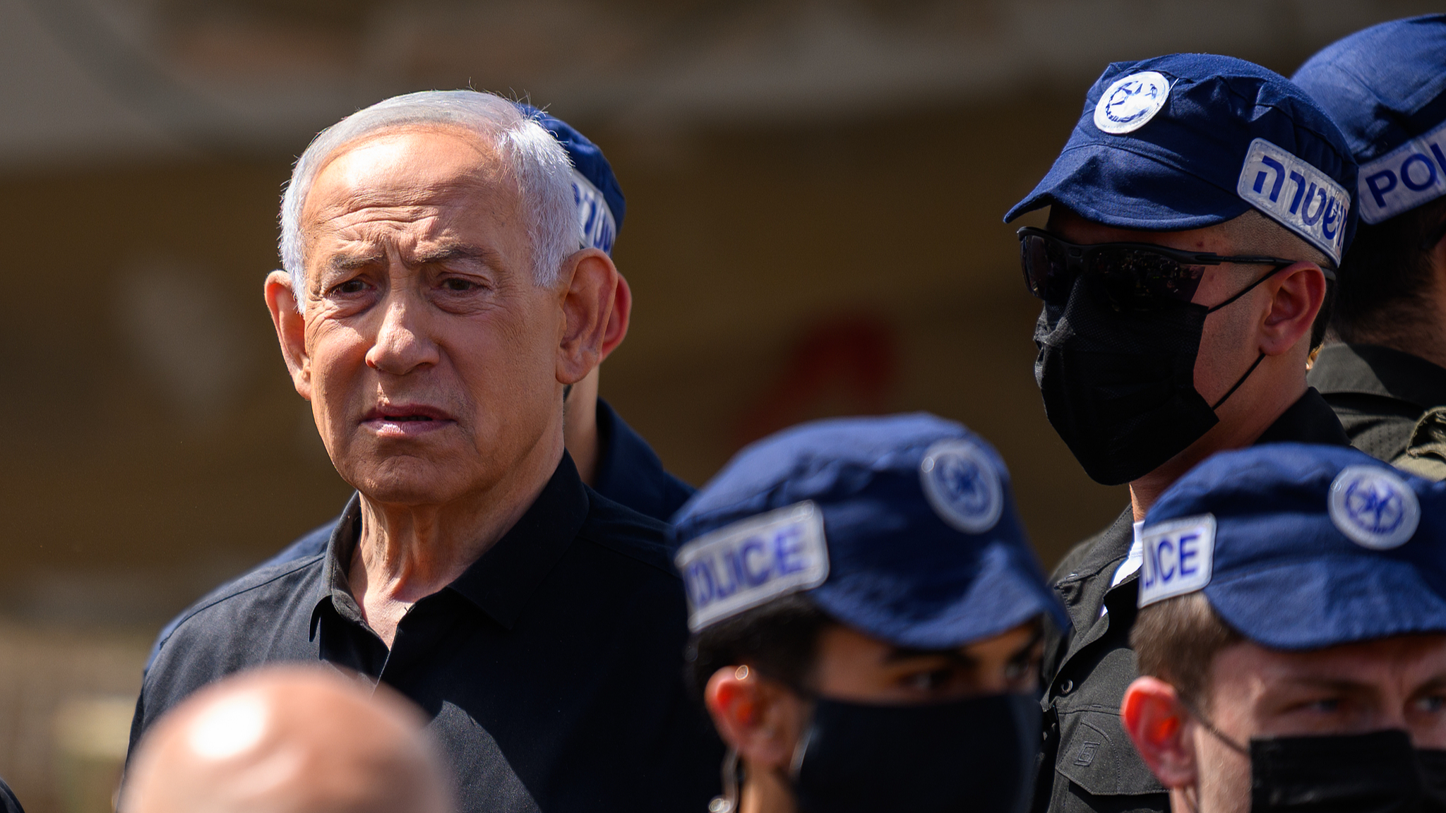 Israeli Prime Minister Benjamin Netanyahu reacts during a visit to the area destroyed by an Iranian ballistic missile strike in Dimona, Israel, March 22, 2026. /VCG