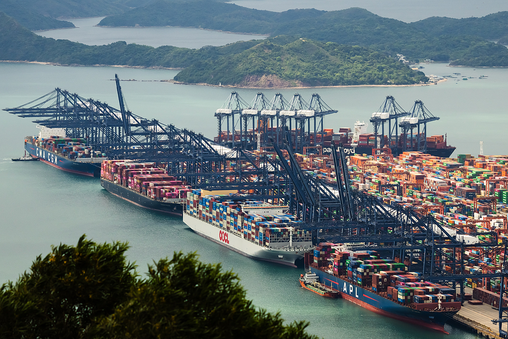 Container ships are seen docked alongside gantry cranes at Yantian Port, Shenzhen, south China's Guangdong Province, April 30, 2026. /VCG