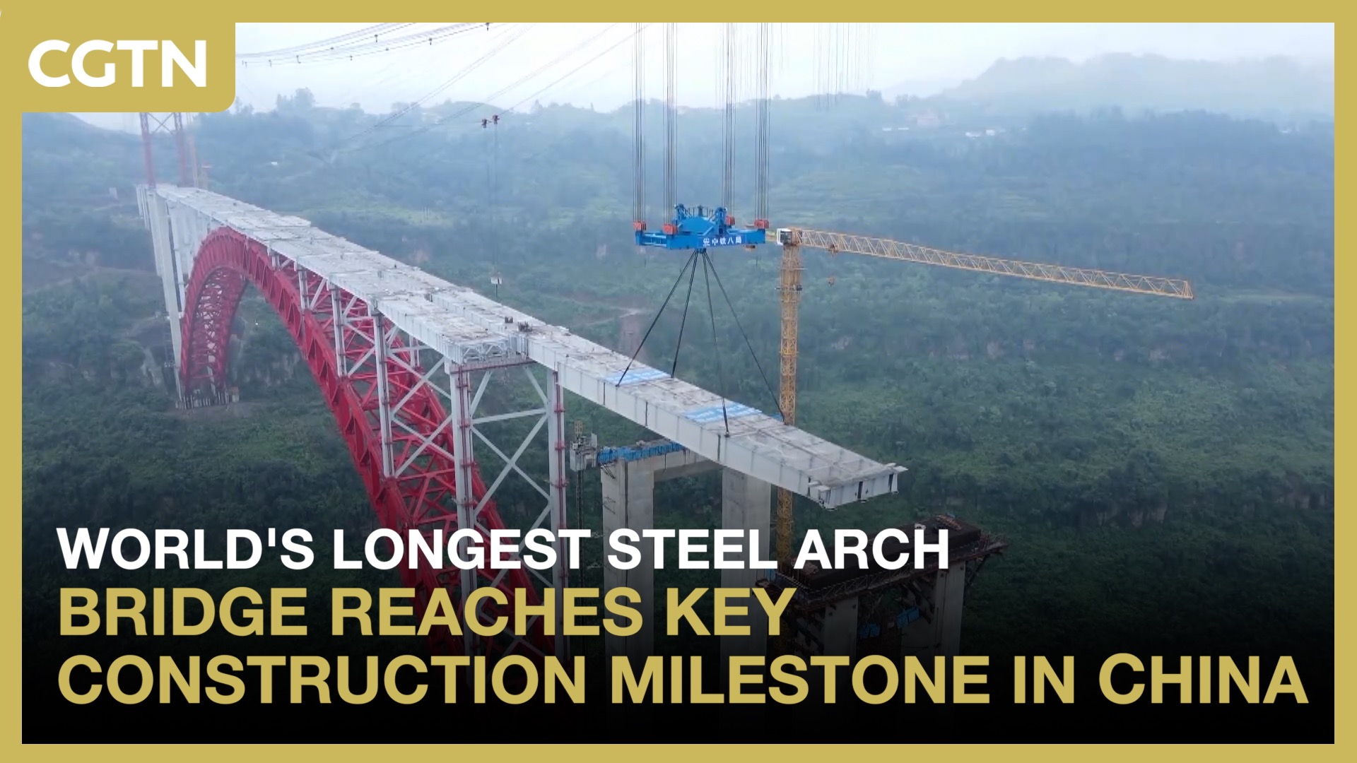 World's longest steel arch bridge reaches key construction milestone in China