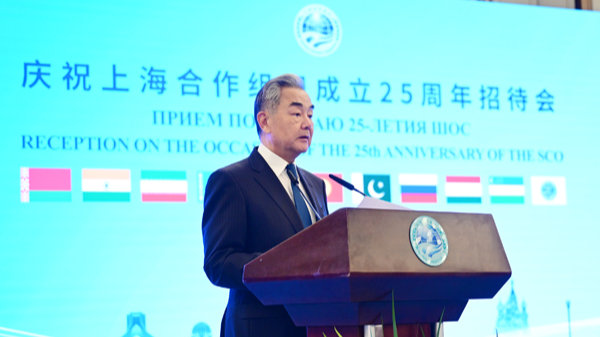 Chinese Foreign Minister Wang Yi addresses a reception to celebrate the 25th anniversary of the Shanghai Cooperation Organization, Beijing, capital of China, June 15, 2026. /Chinese Foreign Ministry
