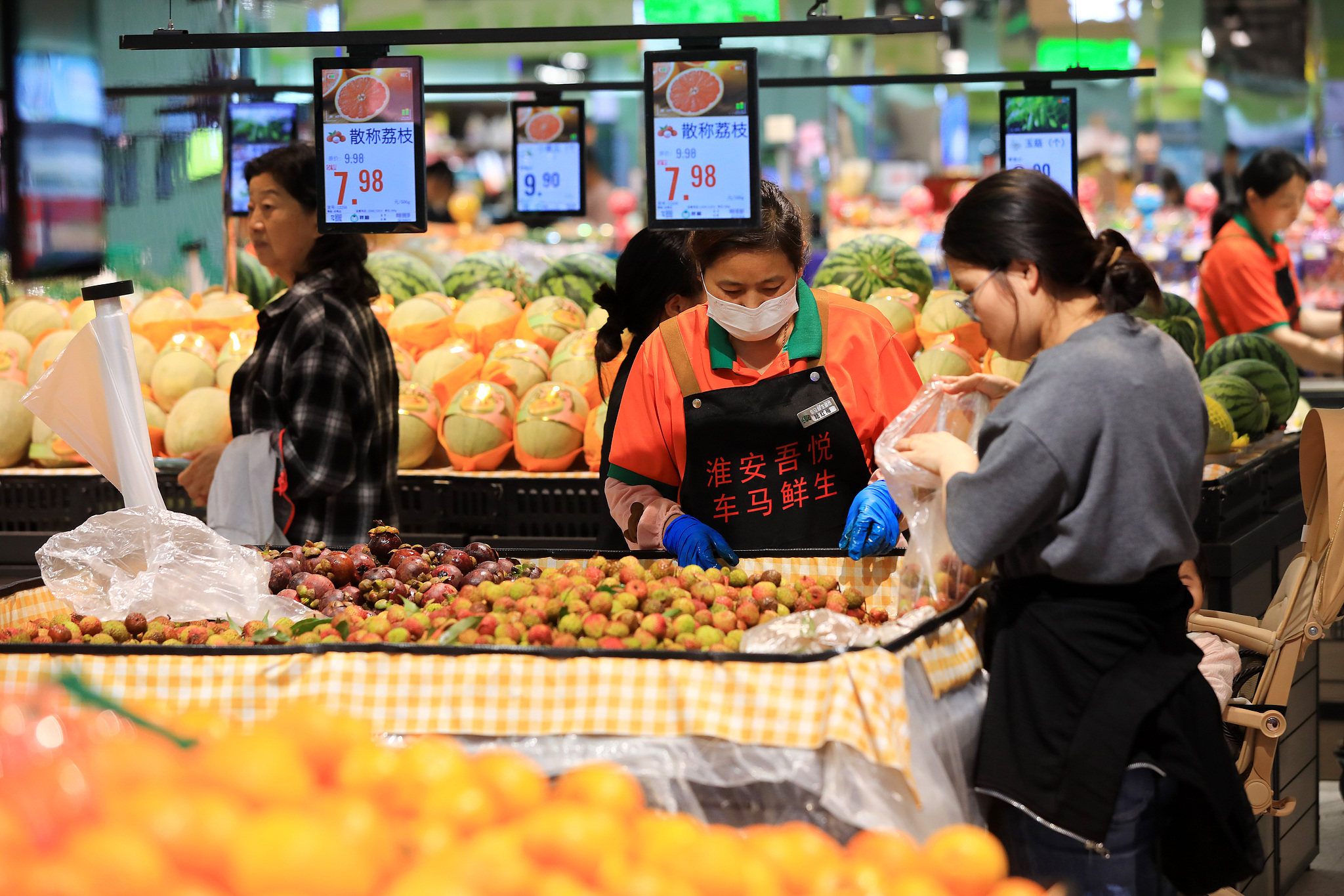 Citizens shopping at a grocery store in Jiangsu Province, China, June 13, 2026. /VCG