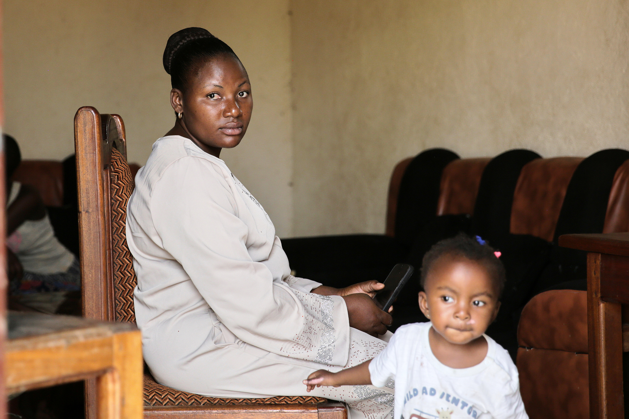 An Ebola survivor poses for a photo at her home in Beni, Democratic Republic of the Congo, June 2, 2026. /VCG
