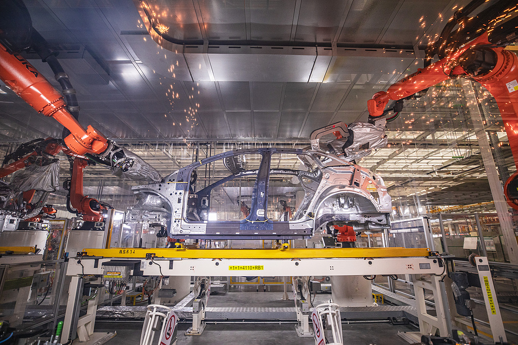 Staff work at Volkswagen's smart electric vehicle factory in Hefei, east China's Anhui Province, on September 25, 2024. /CFP
